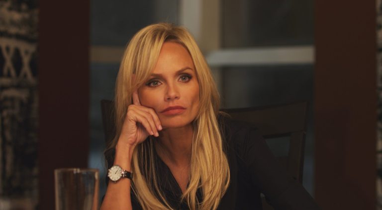 This publicity photo released by ARC Entertainment shows Kristin Chenoweth as Samantha Smith-Dungy in a scene from the film, 