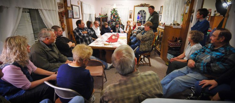 Voters debate during a caucus of precinct 42 near Smithland, Iowa, Tuesday, Jan. 3, 2012. (AP Photo/Dave Weaver)
