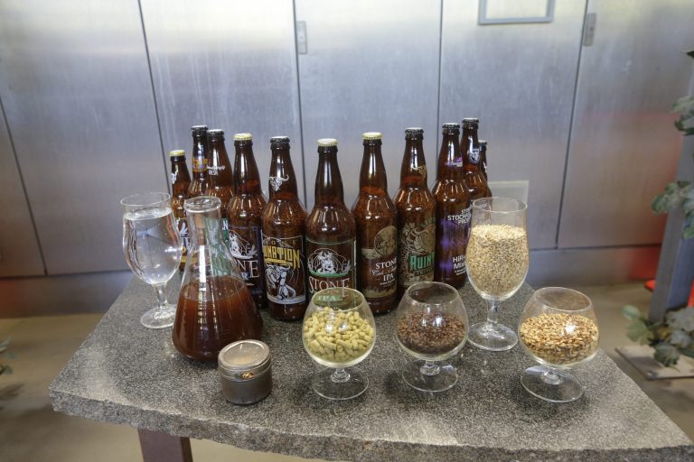 Industry fears calorie rules may force restaurants to stop selling craft beers. (AP Photo/Gregory Bull)