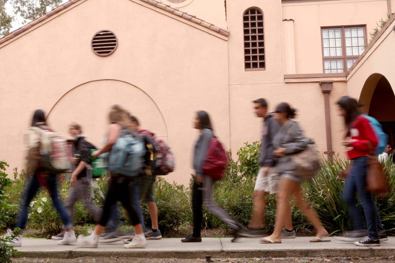 Students at Sequoia High School in Redwood City Calif. make their way bak to class after a special assembly on Thursday, Sept. 18, 2014. During the assembly Facebook gifted 50 laptops to the school and CEO Mark Zuckerberg answered questions in front of hundreds of students as part of Facebook's campaign to encourage students to pursue careers in science, technology, engineering and math or what are otherwise known as STEM fields. (AP Photo/Alex Washburn)