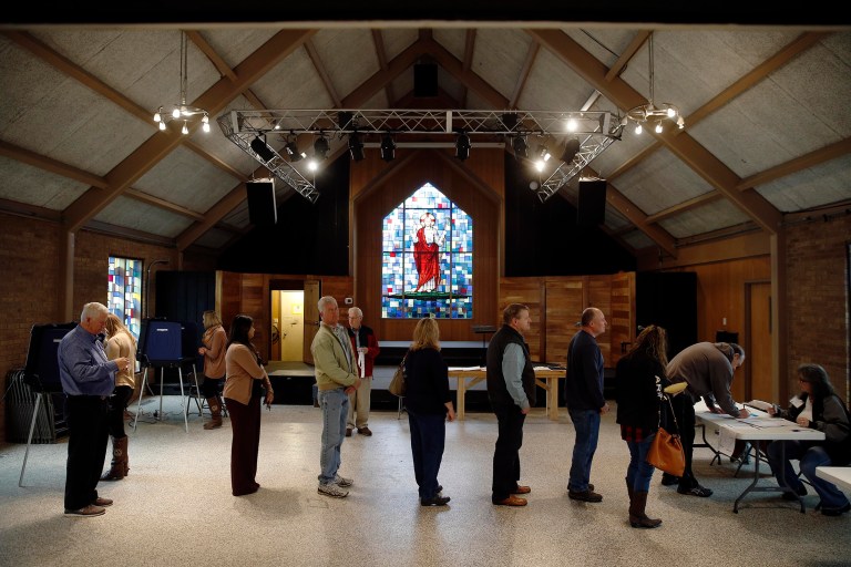 South Carolina voters arrive to vote in the Republican presidential primary Saturday, Feb. 20, 2016, at Mt. Horeb United Methodist Church in Lexington, S.C. (AP Photo/Matt Rourke)