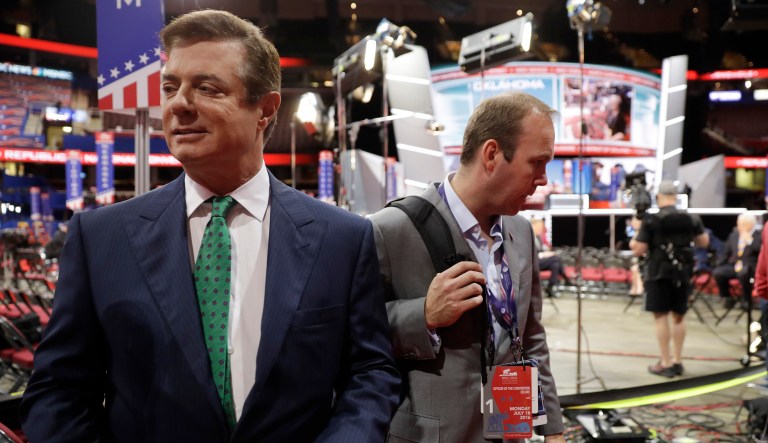 Former Trump campaign chairman Paul Manafort and Rick Gates were asked to surrender to the FBI on Monday. (AP Photo/Matt Rourke)