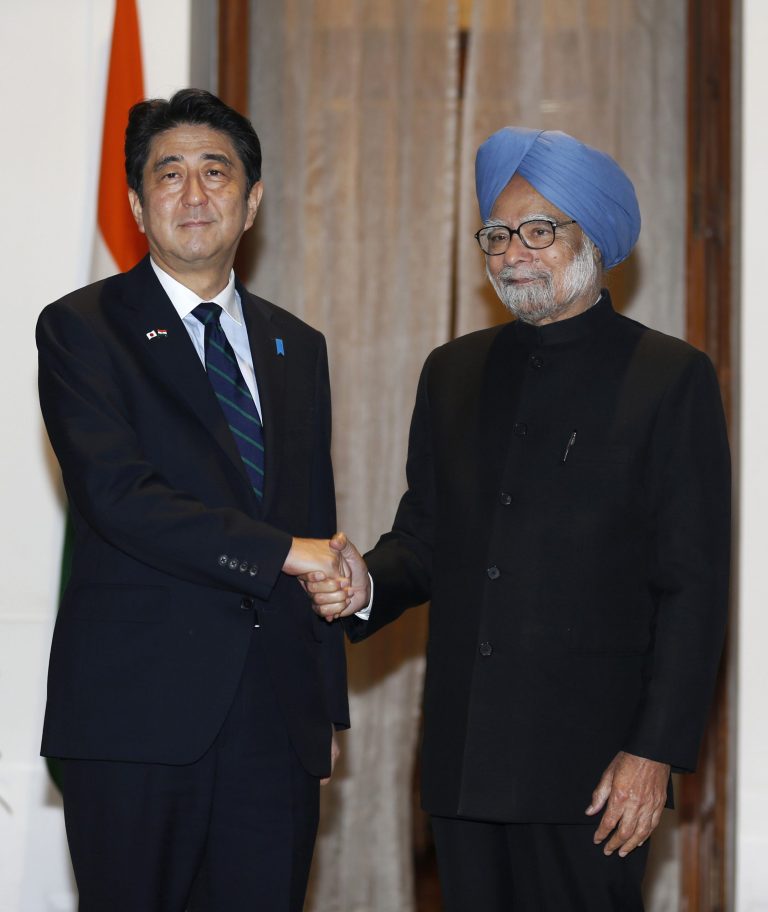 Japanese Prime Minister Shinzo Abe shakes hand with Indian Prime Minister Manmohan Singh before a meeting in New Delhi, India, Saturday, Jan. 25, 2014. Abe arrived Saturday on a three-day official visit to India and will also be the Chief Guest on Indiaâs Republic Day parade, celebrated on Jan. 26. (AP Photo/Saurabh Das)