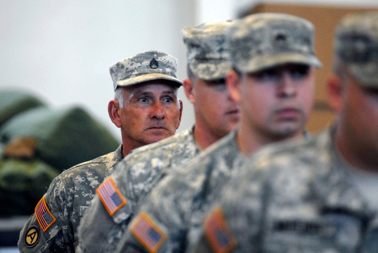 Staff Sgt. Vernon Jones of Grimes, Calif., stands in formation at the National Guard Armory in Oroville. (AP Photo/Appeal-Democrat, Chris Kaufman)