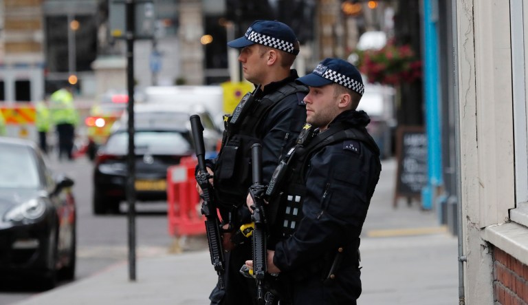 Police patrol the street in the London Bridge area of London, Sunday, June 4, 2017. (AP Photo/Frank Augstein)