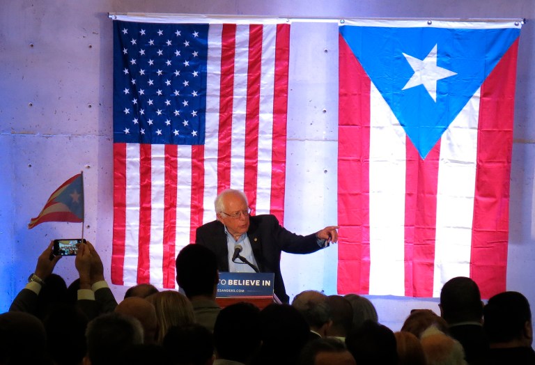 Experts argued that the Fed would not have the authority to aid Puerto Rico, as Sen. Bernie Sanders called for in San Juan on Monday, under the limits on its emergency loan powers imposed as part of the 2010 Dodd-Frank financial reform law. (AP Photo/Danica Coto)