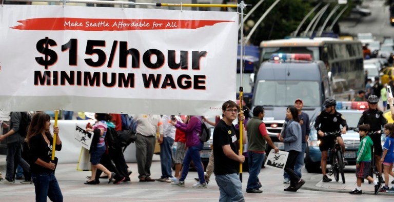 Advocates at a rally to raise the minimum wage. AP Photo
