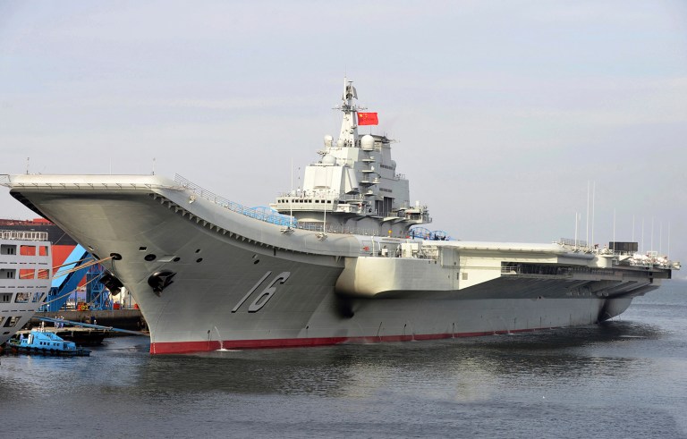 China's military says its first aircraft carrier group has carried out a series of fighter launch, recovery and air combat exercises in the Yellow Sea. (AP Photo/Xinhua, Li Tang, File)