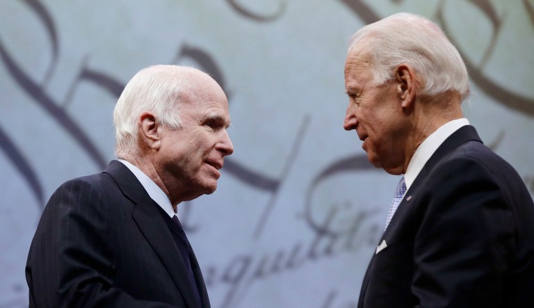 Sen. John McCain, R-Ariz., receives the Liberty Medal from Chair of the National Constitution Center's Board of Trustees, former Vice President Joe Biden, in Philadelphia, Monday, Oct. 16, 2017. The honor is given annually to an individual who displays courage and conviction while striving to secure liberty for people worldwide. (AP Photo/Matt Rourke)