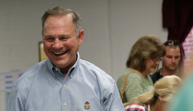 Walking into a conference meeting with Senate Republicans Tuesday, Alabama Senate GOP candidate Roy Moore said that 