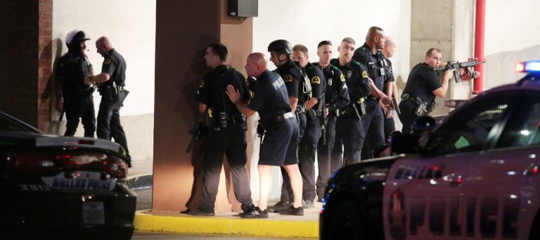 In Dallas, snipers opened fire on police officers during the protests; several officers were killed, police said. (Maria R. Olivas/The Dallas Morning News via AP)