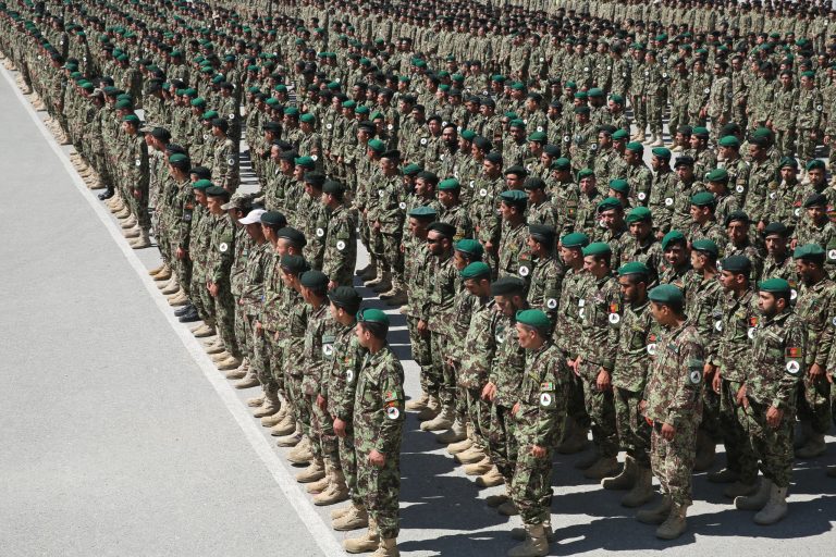 Afghanistan's National Army soldiers stand guard during their graduation ceremony at the Kabul Military Training Center in Kabul, Afghanistan, Sunday, June 1, 2014. (AP Photo/Massoud Hossaini)