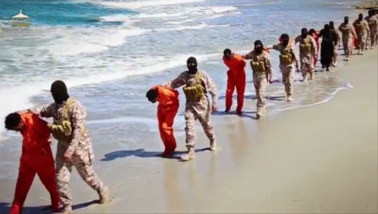 A group of captured Ethiopian Christians taken to a beach before they were killed by Islamic State militants, in Libya. The 29-minute video released online Sunday purportedly shows two groups of captives. (Militant video via AP)
