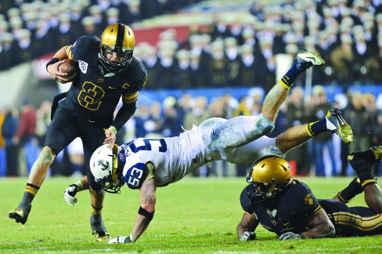 Matt Slocum/AP
Navy linebacker Cody Peterson finished with a team-high 14 tackles against Army, helping the Midshipmen reclaim the Commander-in-Chief's Trophy.