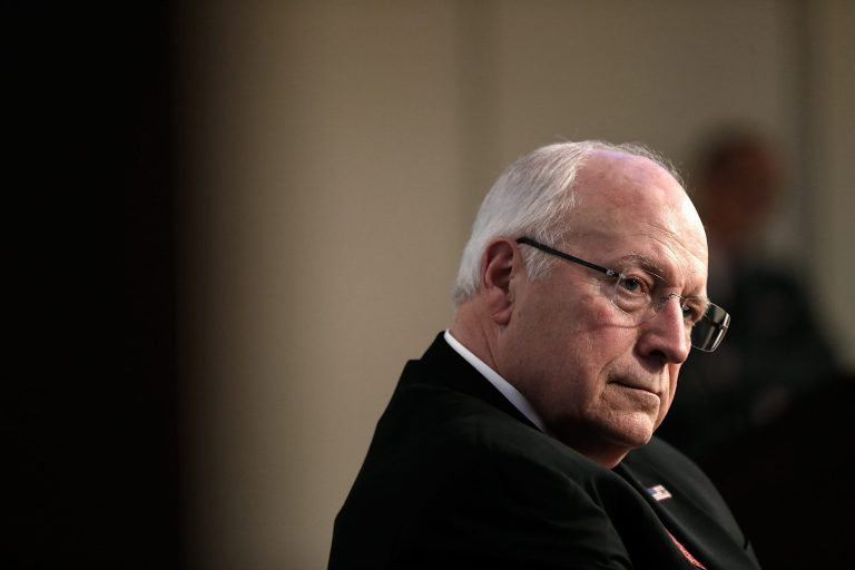 Former Vice President Dick Cheney listens as his wife Lynne Cheney speaks about her book 