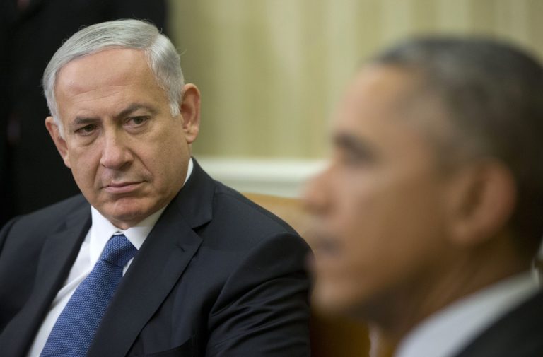 Israeli Prime Minister Benjamin Netanyahu listens as President Barack Obama speaks during their meeting in the Oval Office of the White House in Washington. (AP/Pablo Martinez Monsivais)