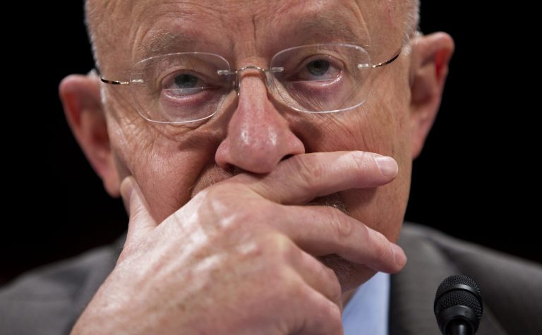 Director of National Intelligence James Clapper pauses while testifying on Capitol Hill in Washington, Tuesday, Oct. 29, 2013, before the House Intelligence Committee hearing on potential changes to the Foreign Intelligence Surveillance Act (FISA). Faced with anger over revelations about U.S. spying at home and abroad, members of Congress suggested Tuesday that programs the Obama administration says are needed to combat terrorism may have gone too far. (AP Photo/ Evan Vucci)