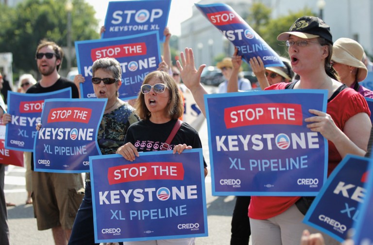 Activists stage a sit-in and protest against the Keystone XL pipeline outside the U.S. State Department.(Alex Wong/Getty images)