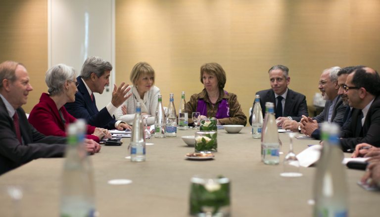 In this Nov. 9, 2013, photo, U.S. Secretary of State John Kerry, third left, meets with EU High Representative for Foreign Affairs, Catherine Ashton, center, and Iranian Foreign Minister Mohammad Javad Zarif, third right,  at the Iran Nuclear talks in Geneva, Switzerland. The deadlocked international effort to sign a nuclear deal with Iran has spurred a global blame game over who walked away from the negotiating table and why. It's a war of words playing out in public statements from top officials and across social media, with a bluntness that stands in stark contrast to the secretive and diplomatic nature of the negotiations themselves. And it raises questions about whether the debate will compound the years of mistrust between Iran and the West when the parties reconvene in Geneva for another round of talks next week. (AP Photo/Jason Reed, Pool)