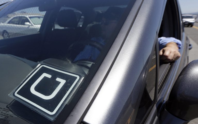 Classifying drivers as employees could have raised Uber's expenses and allowed them to join a labor union. (AP Photo/Jeff Chiu, File)