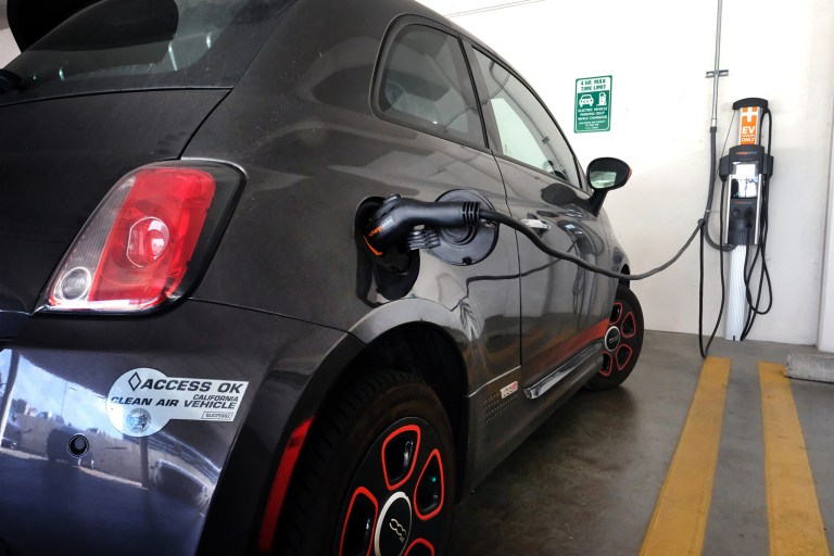 Interest from young adults is rising as automakers manufacture more models of battery-charged vehicles. (AP Photo/Richard Vogel)