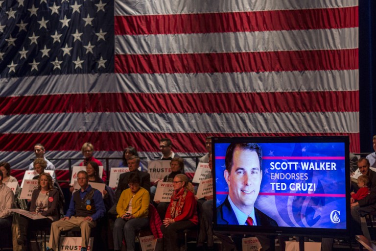 Earlier this year, Walker signed an overhaul of state civil service rules for hiring and dismissing workers. (AP Photo/Tom Lynn)