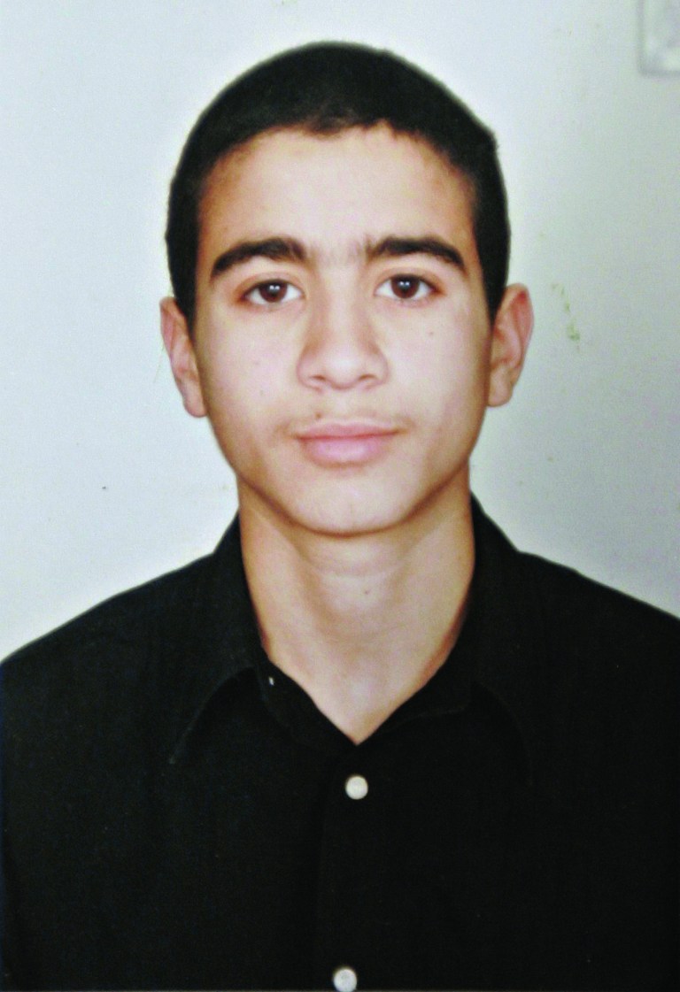 FILE - This undated photo shows Guantanamo detainee Omar Khadr, a Canadian, taken before he was imprisoned in 2002 at the age of 15. A decade after Khadr was pulled near death from the rubble of a bombed-out compound in Afghanistan, the Canadian citizen set foot on Canadian soil early Saturday, Sept. 29, 2012, after an American military flight from the notorious prison in Guantanamo Bay. Khadr pleaded guilty in 2010 to killing a U.S. soldier in Afghanistan and was eligible to return to Canada from Guantanamo Bay last October under terms of a plea deal. Canada's conservative government took almost a year to approve the transfer. (AP Photo/Canadian Press, File)