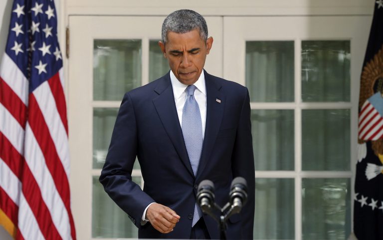   President Barack Obama arrives to make a statement about Syria in the Rose Garden at the White House in Washington, Saturday, Aug. 31, 2013. Delaying what had appeared to be an imminent strike, Obama abruptly announced Saturday that he will seek congressional approval before launching any military action meant to punish Syria for its alleged use of chemical weapons in an attack that killed hundreds. (AP Photo/Charles Dharapak)  