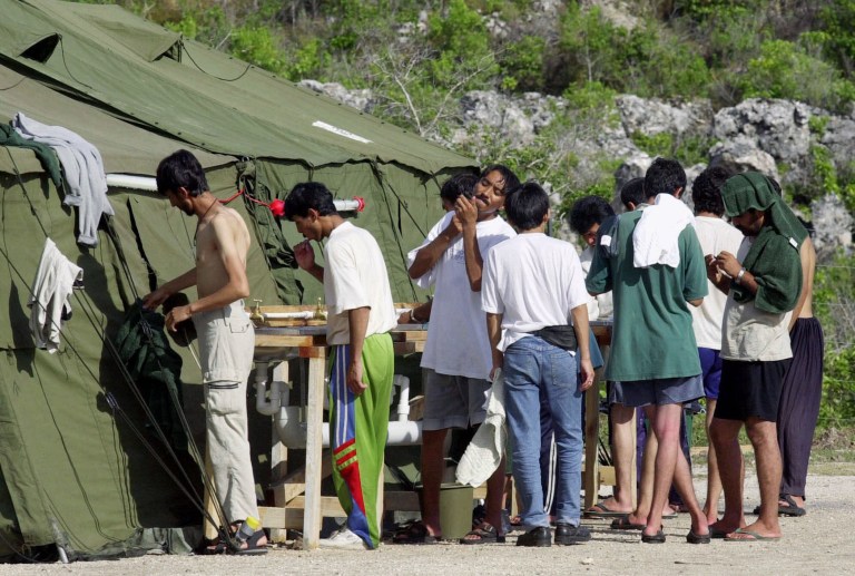 The refugees, who hail largely from Afghanistan and Iraq, traveled to Australia but were denied admittance to the country. (AP Photo/Rick Rycroft, File)