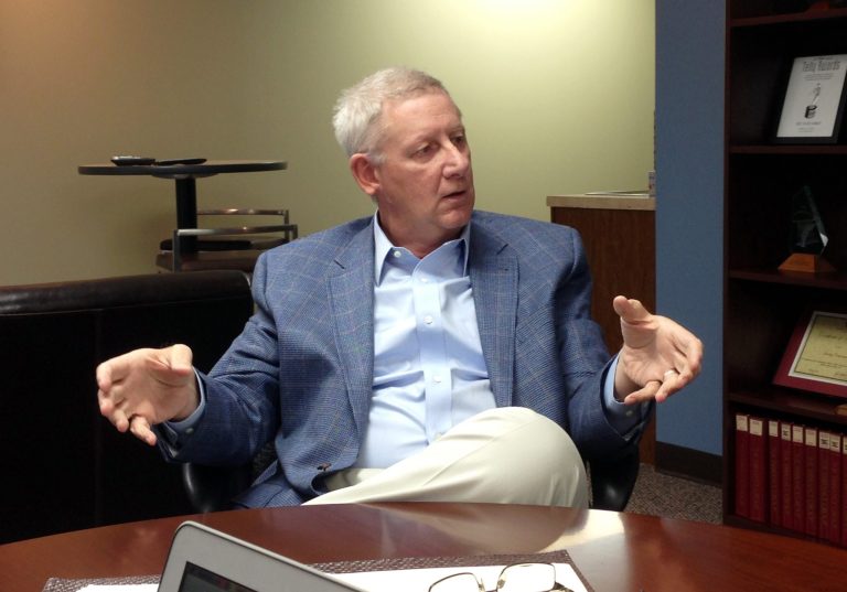 Retired Saginaw-area businessman Paul Mitchell, founder of a super PAC opposed to the election of Democrat Gary Peters, talks with reporters Wednesday, September 18, 2013, in Lansing, Mich. Mitchell is paying for the first TV ads in Michigan's U.S. Senate race. (AP Photo/David Eggert)