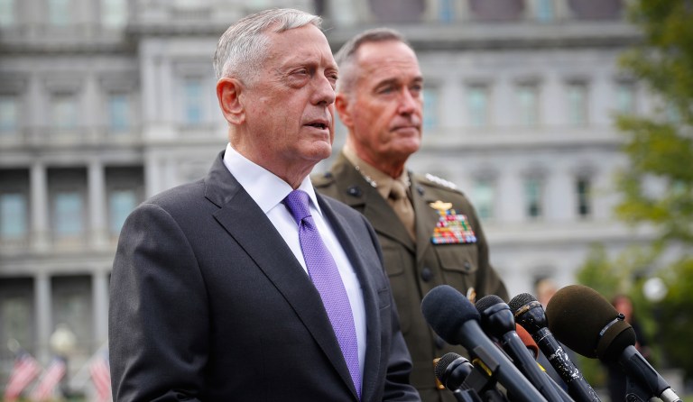 Defense Secretary Jim Mattis, left, accompanied by Joint Chiefs Chairman Gen. Joseph Dunford, right, speaks to members of the media outside the West Wing of the White House in Washington, Sunday, Sept. 3, 2017, regarding the escalating crisis in North Korea's nuclear threats. (AP Photo/Pablo Martinez Monsivais)