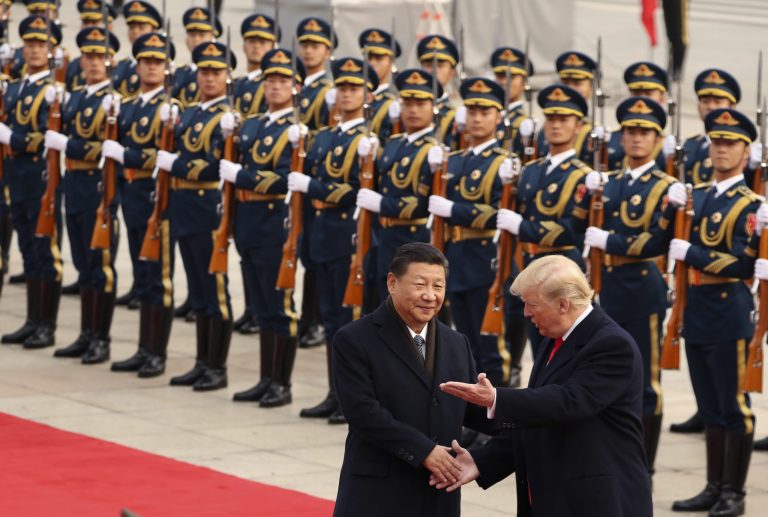 President Trump (right) and Chinese President Xi Jinping (left) participate in a welcome ceremony at the Great Hall of the People in Beijing, China, on Nov. 9, 2017. Trump couldn't seem to stop talking about the red carpets, military parades, and fancy dinners that were lavished upon him during 