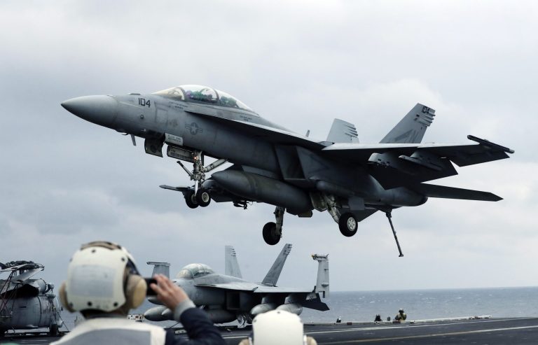 A U.S. Navy's F/A-18 Super Hornet fighter approaches the deck of the Nimitz-class aircraft carrier USS Carl Vinson during the annual joint military exercise called Foal Eagle between South Korea and the United States at an unidentified location in the international waters, east of the Korean Peninsula. (AP Photo/Lee Jin-man)