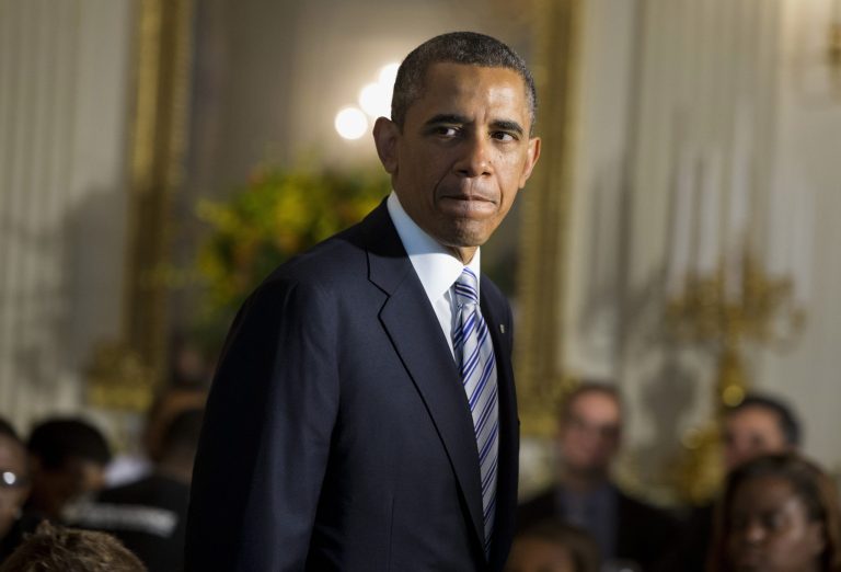 President Barack Obama arrives in the State Dining Room of the White House in Washington, Friday, June 14, 2013, where he hosted a Father's Day luncheon. Speaking about Syria, the president  said the use of chemical weapons in Syria crosses a 