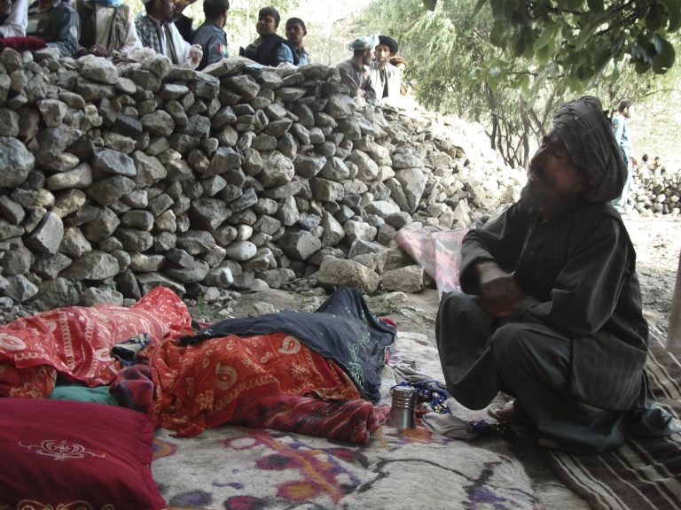   An Afghan man mourns the death of relatives near the site after an earthquake hit Baghlan province, north of Kabul, Afghanistan, Monday, June 11, 2012. As many as 100 people are feared dead after an earthquake struck northern Afghanistan this morning. The governor of Baghlan province says the quake triggered a landslide that buried a remote village under mud and rocks. He says rescuers have so far pulled two bodies from the rubble, while the U.N. confirms one other death. The world body says houses were destroyed across five districts in all. (AP Photo/Jawed Basharat)  