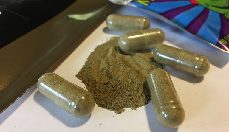 Kratom tastes like green tea when it's brewed and sometimes is taken as a pill. (AP Photo/Mary Esch, File)