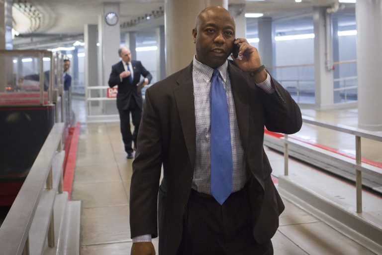 Sen. Tim Scott, R-S.C., makes his way to the Senate floor for a vote on Monday, March 31, 2014. (Examiner/Graeme Jennings)