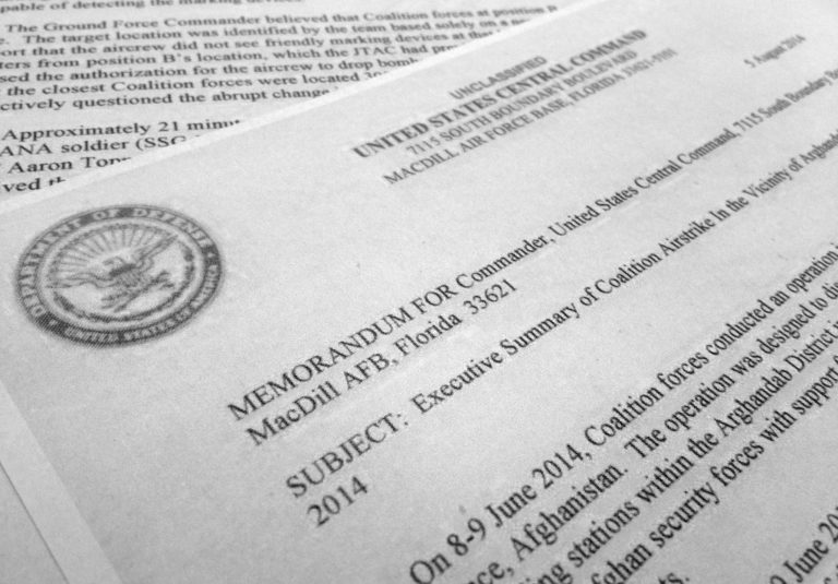 The first page of the report released by U.S. Central Command Thursday, Sept. 4, 2014, on the friendly fire incident in Afghanistan in June is photographed in Washington on Sept. 4, 2014. Avoidable miscommunication between U.S. air and ground forces led to a incident that killed five U.S. soldiers and one Afghan. The report cited a collective failure by soldiers, commanders and air crew members to execute the fundamentals of the mission. As a result, the five Americans and one Afghan were mistaken for the enemy and were attacked with two laser-guided bombs from a B-1 bomber. (AP Photo/Jon Elswick)
