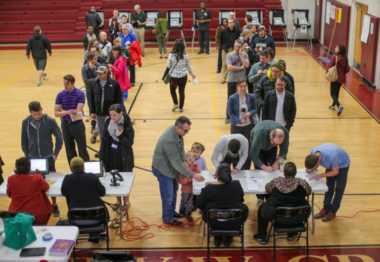 GOP turnout was bigger in each of the 12 states that held primaries or a caucus on Tuesday night, and in some cases, turnout was double than seen in 2008. (John Spink/Atlanta Journal-Constitution via AP)