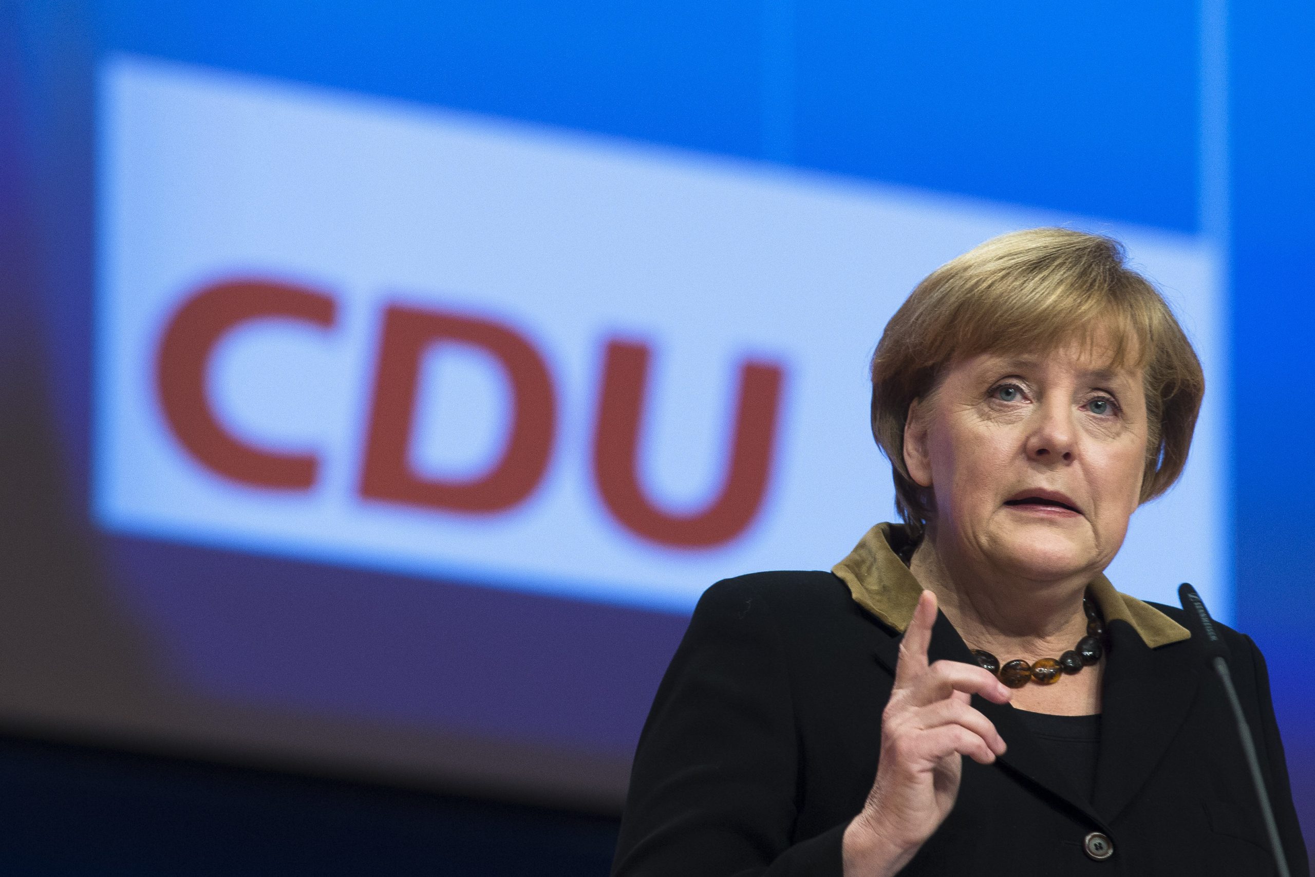 Germany’s Merkel sets stage for 2013 elections