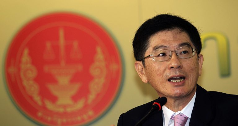 Thailand's Constitutional Court Secretary-General Pimol Thampitakpong speaks during a news conference at his office in Bangkok, Thailand Friday, March 21, 2014. The court ruled Friday that a general election held in February was invalid, setting the stage for a new vote and dealing another complication to the country's political crisis. (AP Photo/Sakchai Lalit)