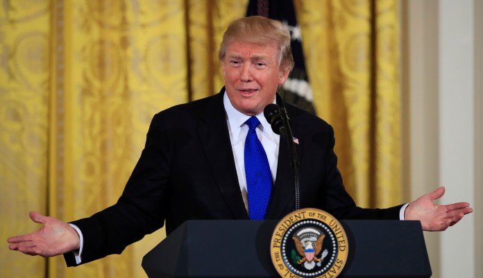 None of the students disputed the interviewer when he asked them to react to President Trump telling Democrats the wall would be 10 feet taller than before, and started a chant to "build the wall." (AP Photo/Manuel Balce Ceneta)