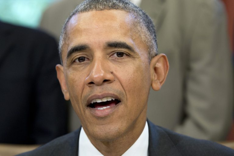 President Obama speaks to the media before signing H.R. 1138 Sawtooth National Recreation Area and Jerry Peak Wilderness Additions Act, Friday, Aug. 7, 2015, in the Oval Office of the White House in Washington. (AP Photo/Carolyn Kaster)