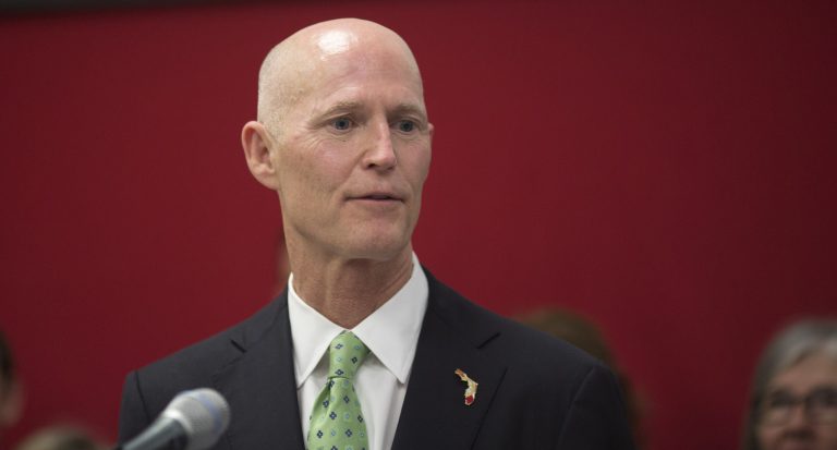 Florida Gov. Rick Scott outlines his education budget recommendations Monday, Jan. 27, 2014 during a stop in Delray Beach, Fla. He wants more money for public schools in the coming year, but he's not asking for as big of an increase as he did last year. The Republican governor wants state legislators to boost spending on public schools by $542 million. (AP Photo/J Pat Carter)