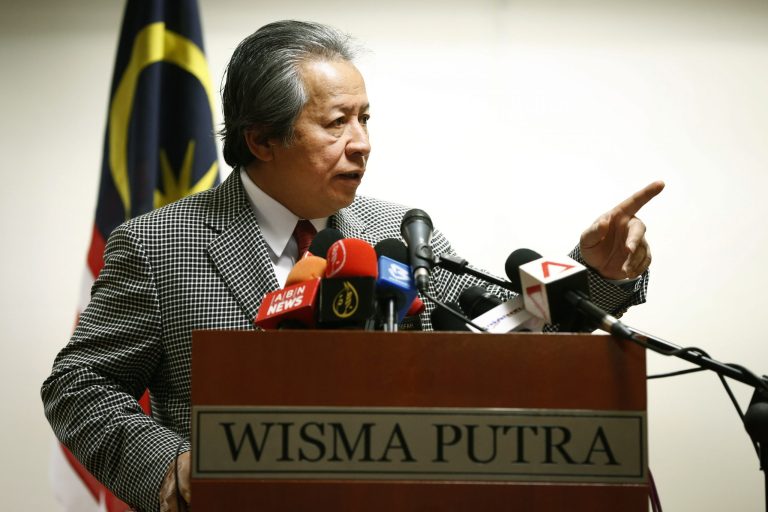 Malaysia's Foreign Minister Anifah Aman speaks during a press conference in Putrajaya, Malaysia, Tuesday, July 1, 2014.  New Zealand officials on Tuesday identified a diplomat charged with sexual assault as Malaysian. The man, Muhammad Rizalman Bin Ismail, evaded the charges in New Zealand by claiming diplomatic immunity and returning home last month. He worked for the Malaysian High Commission in Wellington. He remained listed on the commission's website Tuesday as a staff assistant assigned to defense duties.(AP Photo/Vincent Thian)