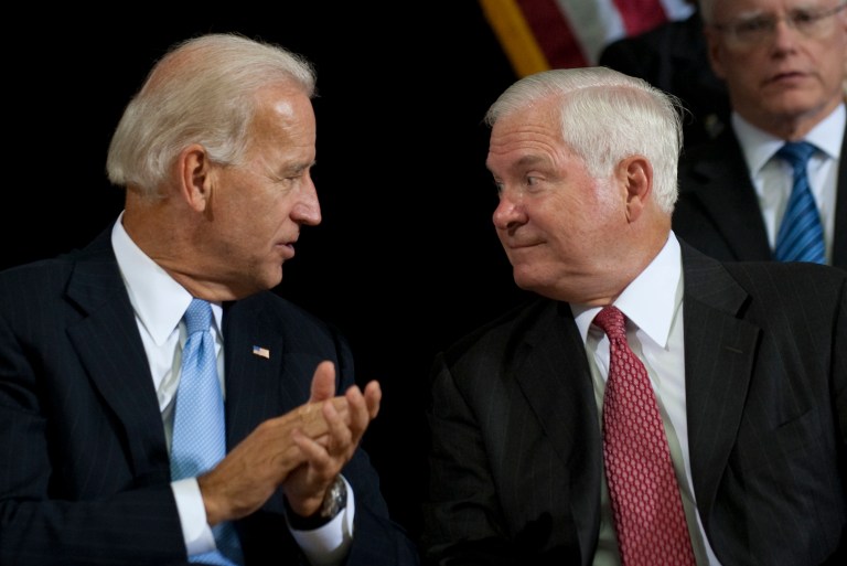 Secretary of Defense Robert Gates, right, speaks with Vice President Biden during the United States Forces-Iraq change of command ceremony in Baghdad on Wednesday Sept. 1, 2010, as a new U.S. military mission in Iraq was launched ending seven years of combat. (AP File)