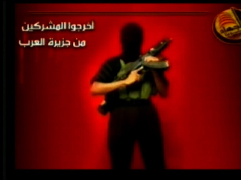 This image taken from video posted on an Islamist website shows an unidentified militant associated with a group calling itself al-Qaida in the Arabian Peninsula. (AP Photo/ APTN)