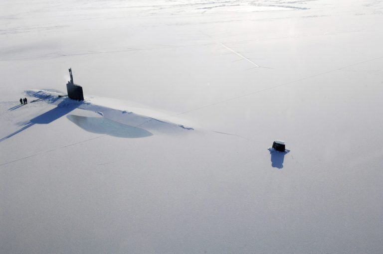 The Los Angeles-class submarine USS Annapolis rests on the Arctic Ocean after breaking through three feet of ice during Ice Exercise in The Arctic Ocean. (Tiffini M. Jones/U.S. Navy)