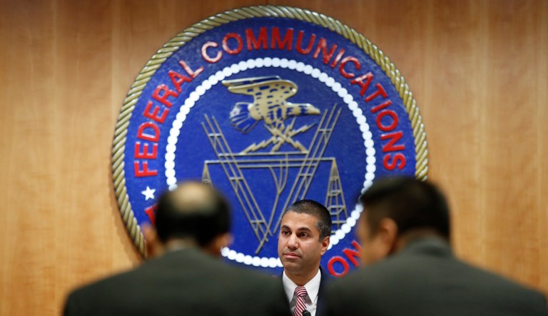 Federal Communications Commission Chairman Ajit Pai takes his seat for the FCC vote on net neutrality. (AP Photo/Jacquelyn Martin)