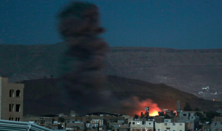 Fire and smoke rise following a Saudi-led airstrike hit an army base in Sanaa, Yemen on Jan. 11, 2017. (AP Photo/Hani Mohammed)